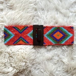 Boutique beaded and wooden stretchy belt.